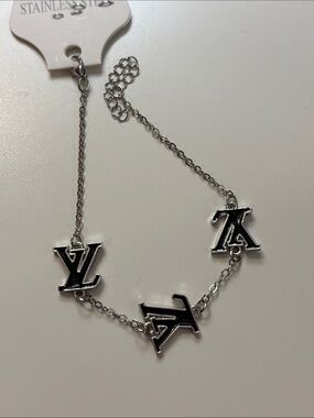 Silver-Tone Logo Link Bracelet - Black Accents